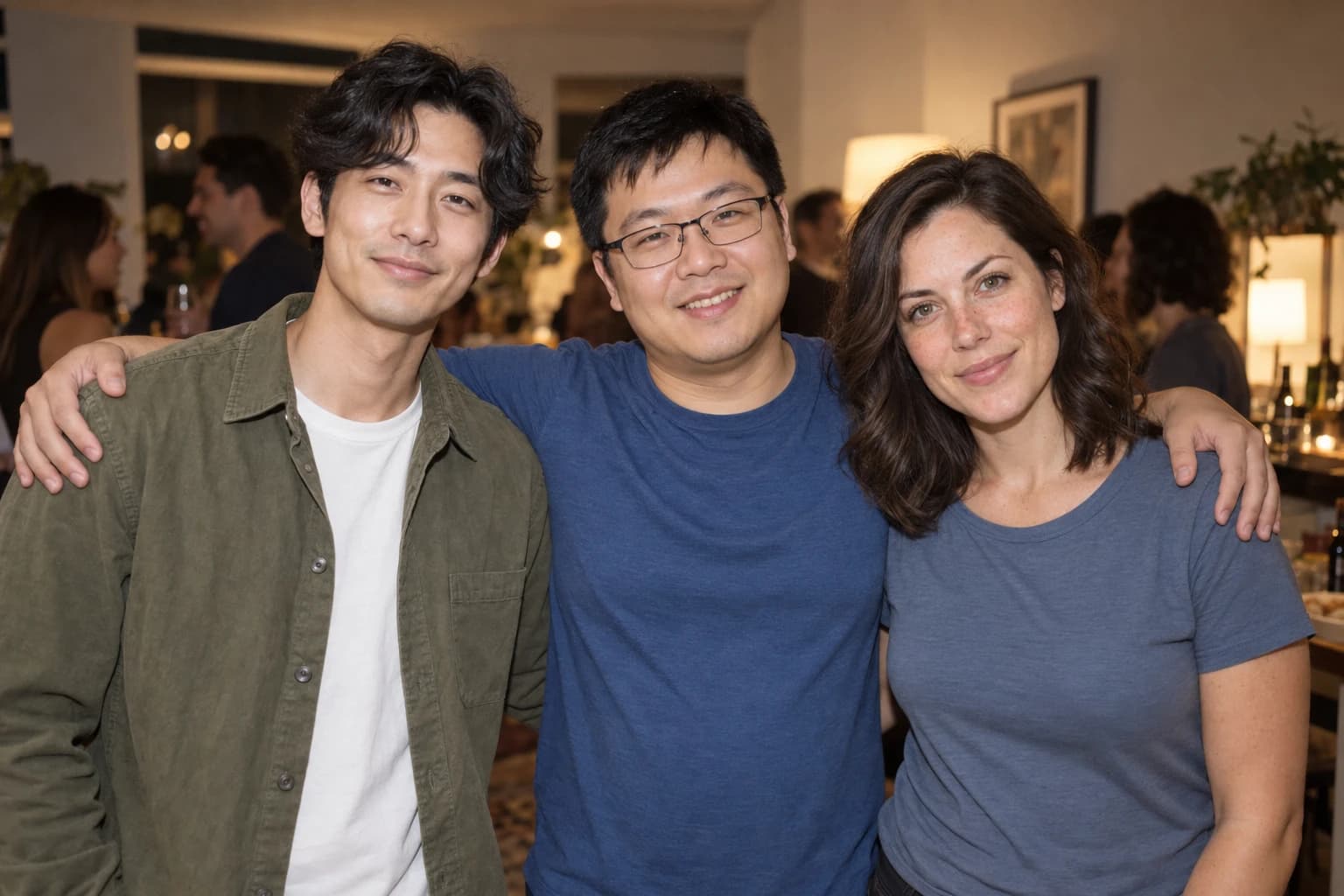 Three friends together in a party photograph